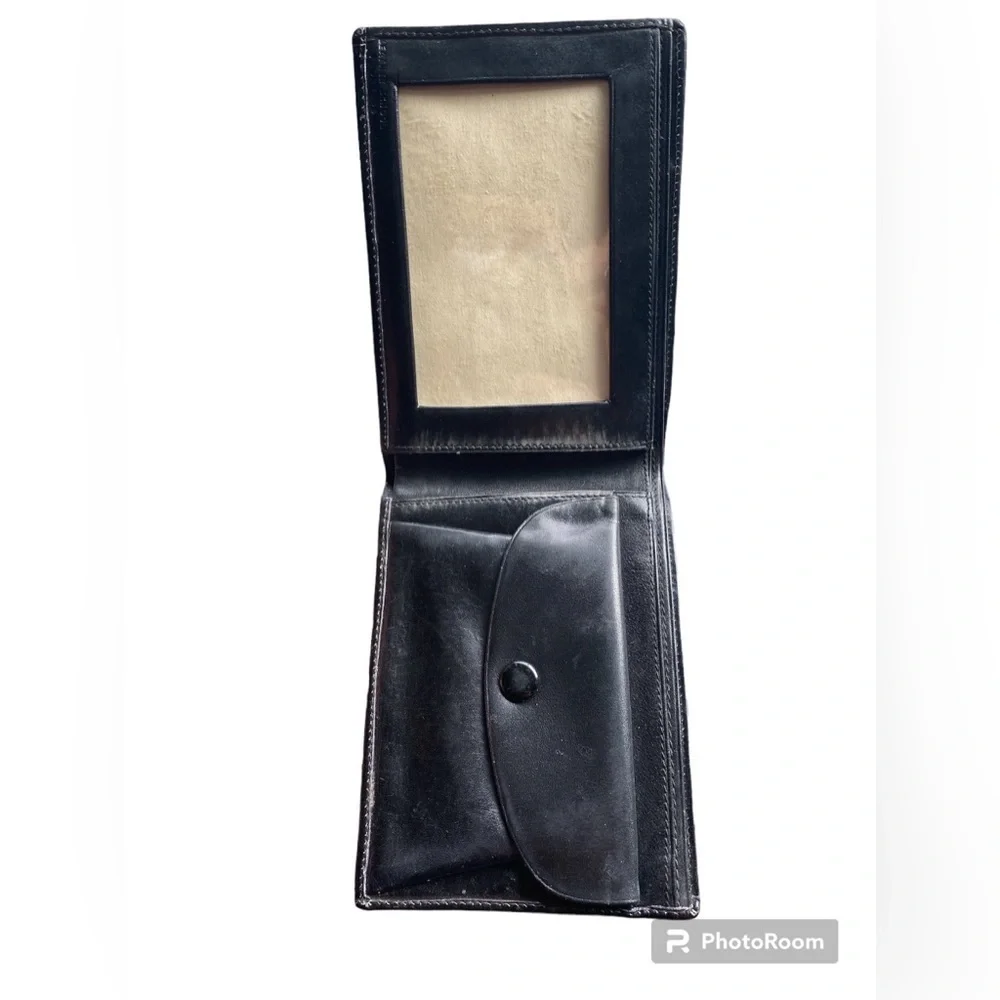 Black leather wallet gold embossed, folded classy.